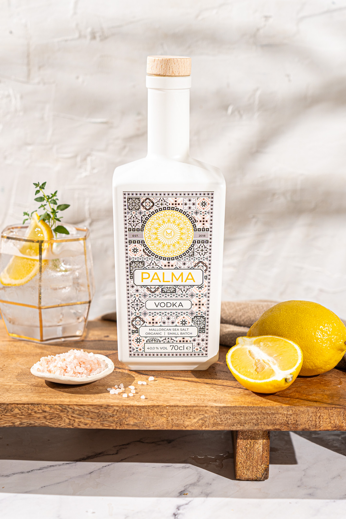 Palma Vodka bottle with citrus garnish